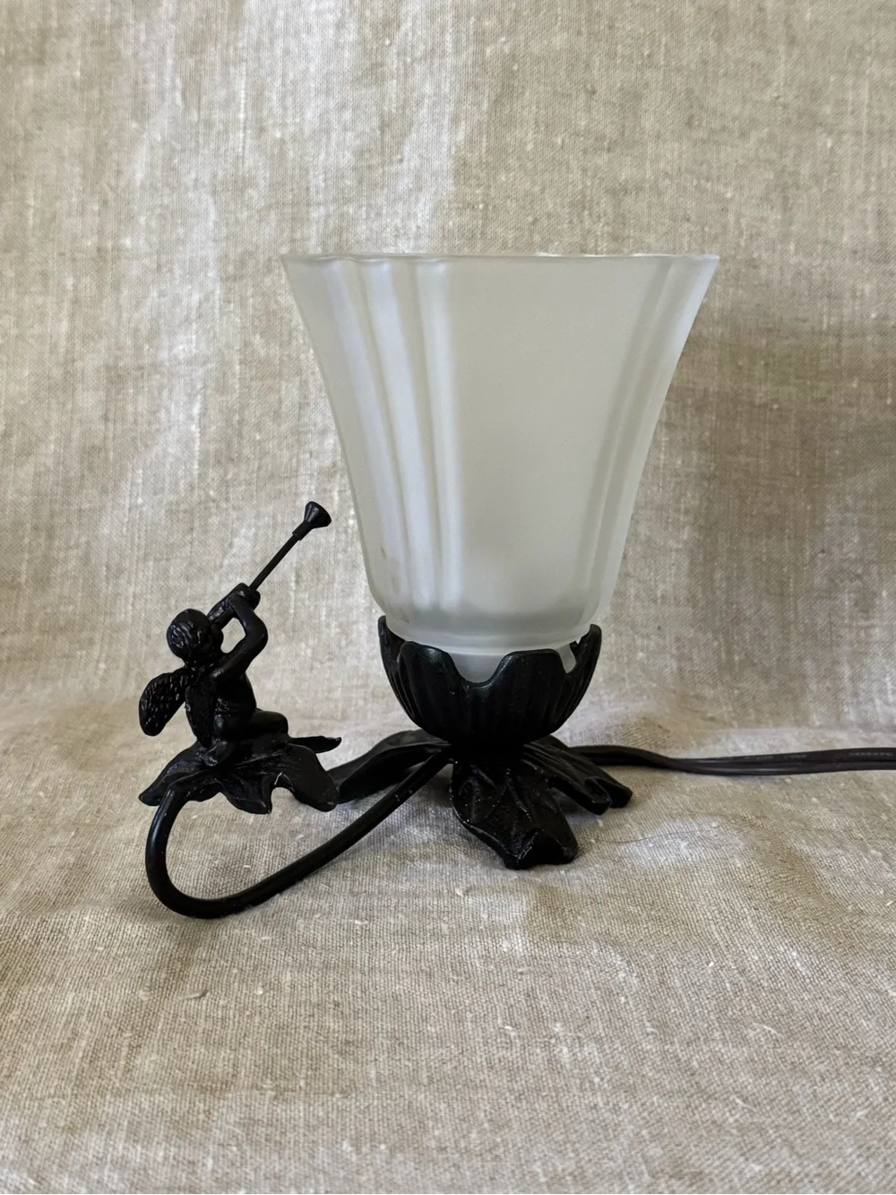 Vintage style cast metal cherub lamp